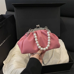 Pink ruched cloud bag with large pearl handle and silver chain on silk lining