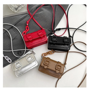 Detailed display of mini laser crossbody bags in four colors with chain straps