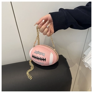 Pink rugby shaped mini bag with white stripes and gold metal chain strap detail