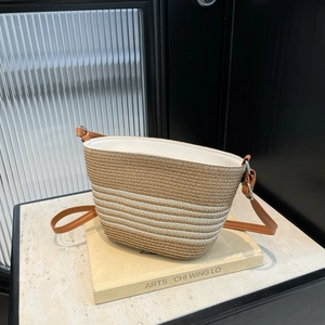 Summer striped straw bucket bag with khaki weave and white stripes for beach travel