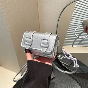 Mini laser crossbody bag in silver cracked leather with purple chain decoration