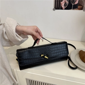 Trendy black crocodile pattern baguette handbag with gold metal clasp for women