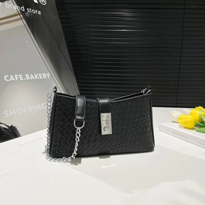 Chic black woven underarm bag with silver chain strap and square metal buckle closure