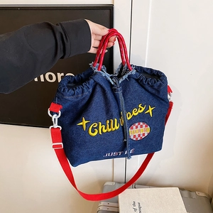 Retro denim tote bag with red rope handles and yellow Chill Vibes embroidery