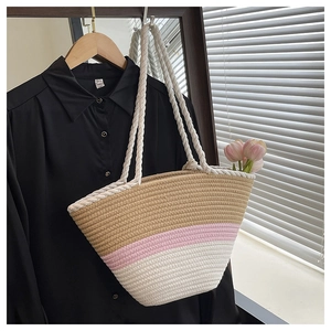 Detail of tricolor woven tote bag with sturdy rope handles and large capacity