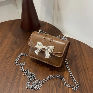 Vintage brown mini crossbody bag for girls with silver metal bow and chain strap
