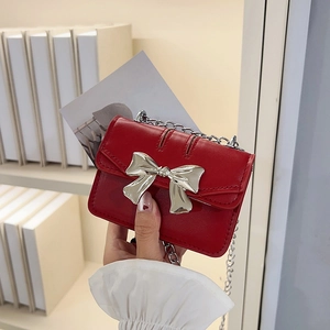 Vintage red mini flap crossbody bag for girls with silver bow and delicate chain strap