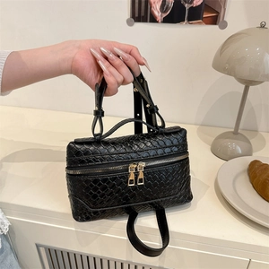 Chic black woven handbag for women with gold double zippers and top handle