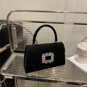 Elegant black suede crossbody bag with crystal square buckle and golden chain strap