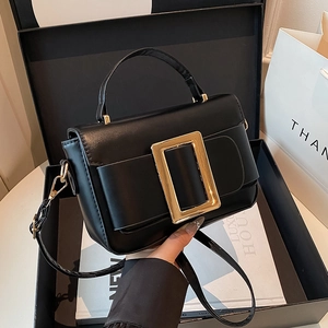 Classic black flap crossbody bag with luxury gold square buckle and fixed top handle