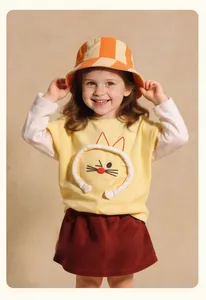 Girl's yellow long sleeve shirt with 3D cat embroidery and red corduroy skirt