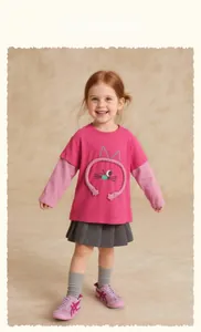 Detail of rose pink long sleeve kids T-shirt with 3D cartoon cat and layered cuffs