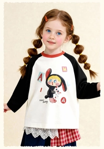 Detail of kids raglan sleeve T-shirt with cute cartoon girl print and red crew neck