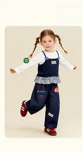 Detailed embroidery on kids navy blue denim pants with cute apple and floral motifs