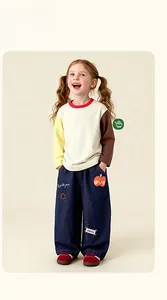 Kids long sleeve patchwork t-shirt and wide leg jeans with colorful embroidery detail