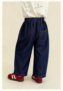 Rear view of kids deep blue wide-leg jeans with red contrast stitching and elastic waistband