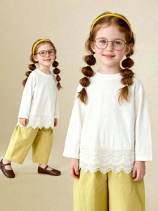 Girls long sleeve white lace trim T-shirt with mustard yellow wide leg pants outfit