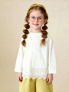 Girls long-sleeve white cotton T-shirt featuring sweet layered lace hem detailing