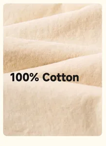 Detailed close-up of 100% natural cotton fabric texture for children's casual pants