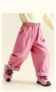 Girl's pink cotton trousers with elastic waist, bunny embroidery and purple plaid cuffs