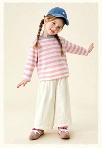 Girl's spring outfit featuring a pink striped long-sleeve tee and cream wide-leg pants