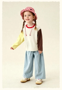 Detailed view of color-block long sleeve tee and sky blue wide-leg cotton pants for kids