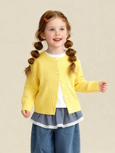 Children's yellow cable knit cardigan with striped texture and white buttons