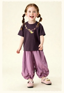 Detail of toddler purple t-shirt with floral heart print and matching ruffled bloomers