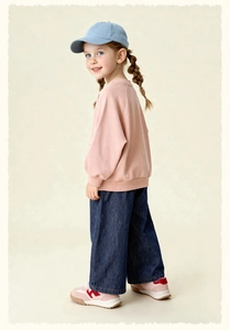 Girls' casual outfit with a pink crewneck sweatshirt and dark blue wide-leg jeans