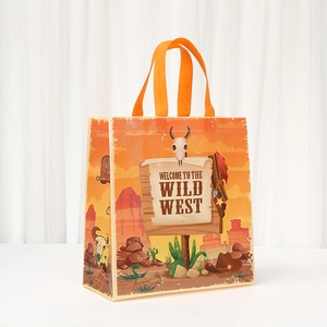 Orange Wild West cartoon gift bag with steer skull print and sturdy carry handles