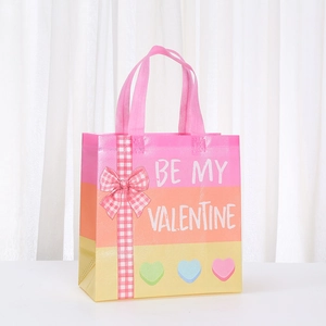Striped Valentine's Day non-woven gift bag with Be My Valentine print and pink handles