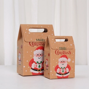 Christmas theme kraft gift bags with Santa Claus graphics and Merry Christmas text