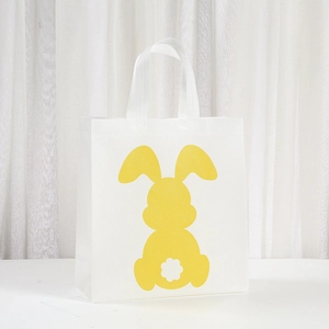 Easter non-woven tote bag with yellow rabbit print and sturdy white handles for gifts