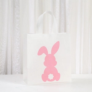 White non-woven Easter rabbit gift bag with pink bunny silhouette and sturdy handles