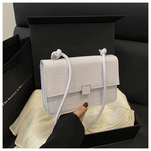 White crocodile pattern mini handbag in a luxury black gift box with satin lining