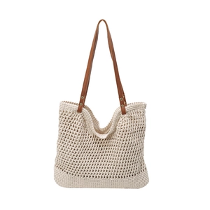 Chic hollow-out woven tote bag with brown faux leather straps and cream knit finish