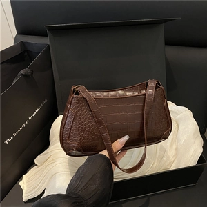 Elegant dark brown crocodile pattern baguette bag with adjustable strap in luxury gift box