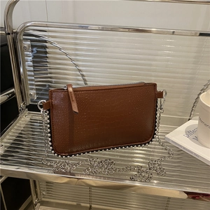 Brown crocodile texture shoulder bag with silver bead trim and metal chain strap
