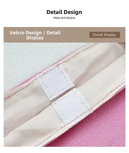 Detalle del bolso tote de tela rosa con cierre de velcro y forro interior resistente
