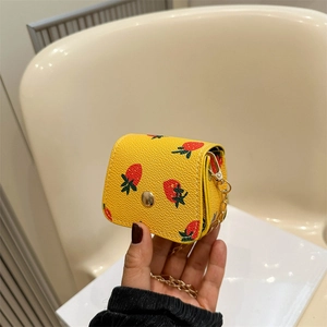 Mini yellow cherry print wallet with gold chain strap and lychee grain PU leather
