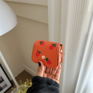Mini orange leather wallet with strawberry print and gold chain strap for women