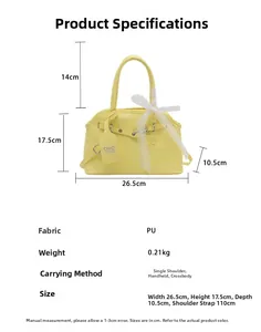 Detailed view of yellow PU shell bag with lace bow, showing dimensions and strap length