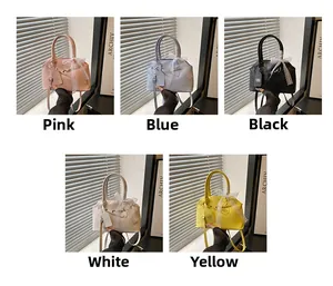 Multi-color shell handbags displayed in pink, blue, black, white, and yellow colors
