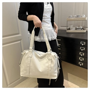 White large capacity tote bag with pleated texture and adjustable side metal buckles