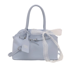 Light blue square handbag with white lace bow and adjustable crossbody strap