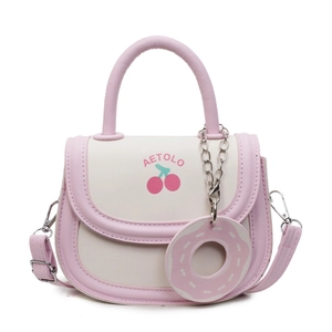 Pink and white minimalist saddle bag with cherry print and donut pendant decoration