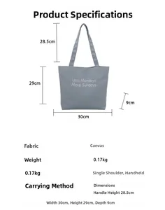 Detailed view of blue canvas tote bag showing dimensions and the Less Mondays More Sundays text