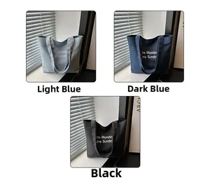 Three colors of large canvas tote bags with Less Monday More Sunday slogan detail