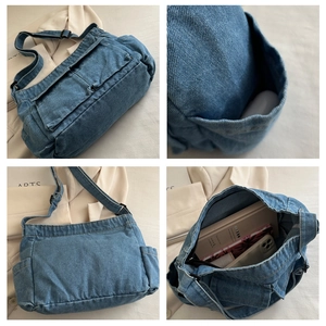 Detail view of denim crossbody bag with multiple pockets and adjustable shoulder strap