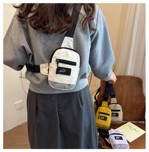 Adjustable white nylon chest bag shown on model with multiple color variants in background